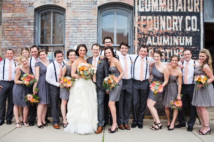 Molly's eight bridesmaids wore J.Crew dresses. Each was a slightly different shade of gray, and they all had different necklines. The groomsmen donned gray Banana Republic slacks, white Ralph Lauren  shirts and Grunion Run suspenders and ties.