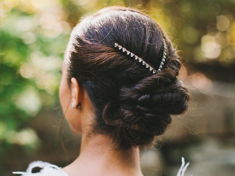 Wedding hair low bun with jewel