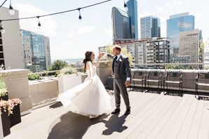 Bride and Groom Share Private Moment on Rooftop