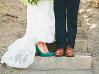 Shot of the bride and groom's shoes on their wedding day. 
