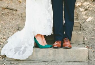Shot of the bride and groom's shoes on their wedding day. 