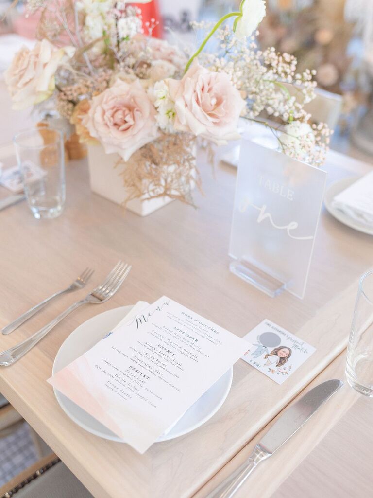 Place setting with scratch-off door game at wedding shower
