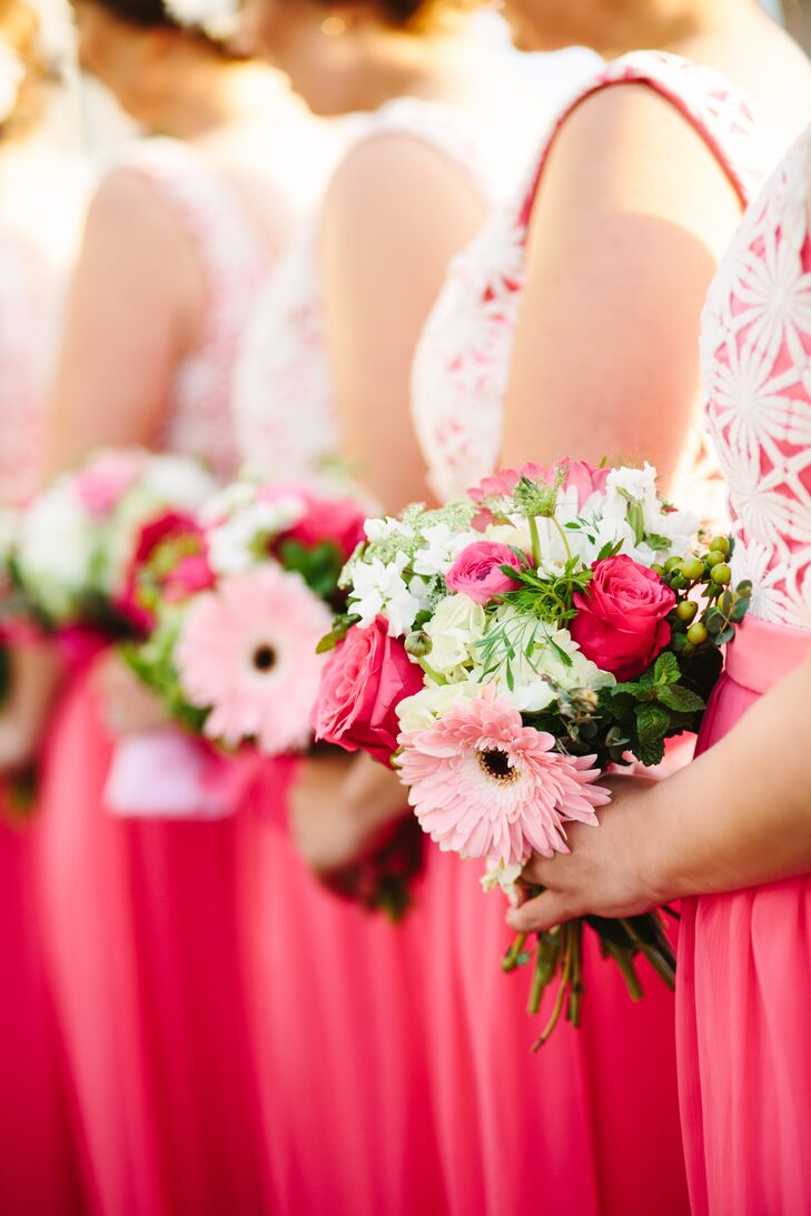 Florist Kathy Buffandeau created bright pink and fuchsia bouquets for Amanda's bridesmaids.