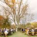 Ceremony in Outdoor Farm Space in Fall, Tall Trees and Minimalistic Aisle Decor