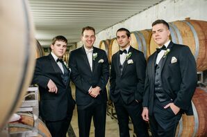 Groomsmen in Black Tuxedos, Groom in a White Bow Tie
