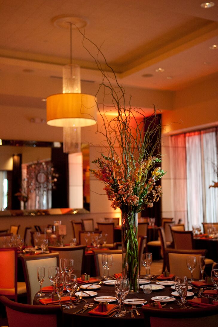 "We absolutely fell in love with look and feel of Marquee-Gershon Fox Ballroom," says Sara. "We really liked the fact that there were different areas of the building for different parts of our wedding. We had the ceremony in the atrium, the cocktail hour upstairs in the mezzanine, and then dinner and dancing in the ballroom. The entire place has an old school, classy feel which fit right in with our style!"
