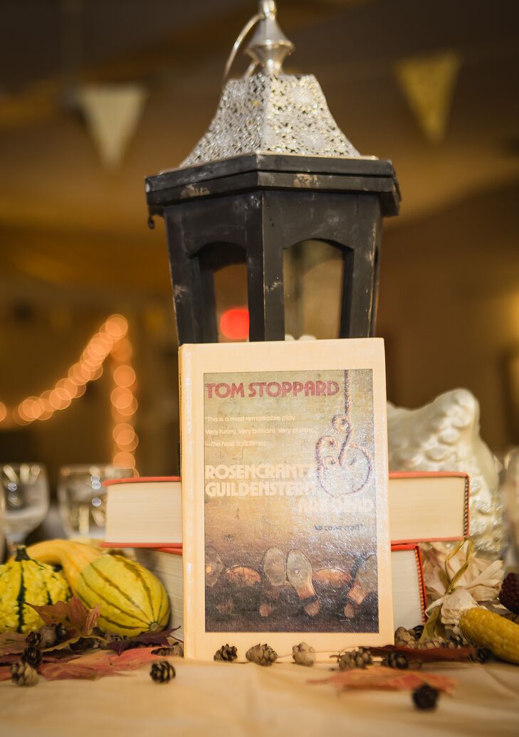 Books were used as centerpiece decor and as table names at the reception.