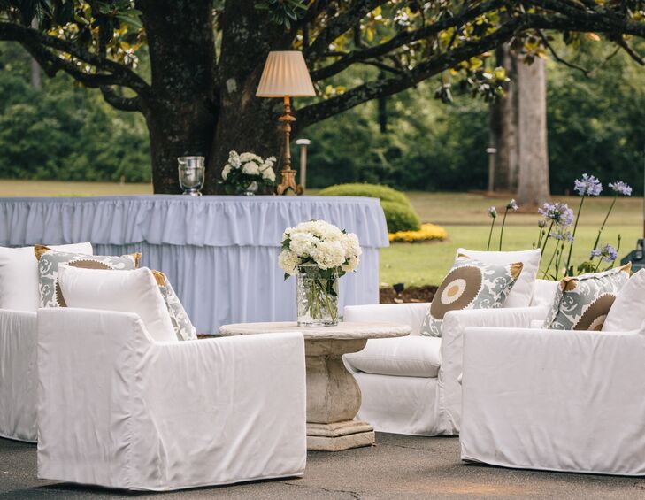 The cocktail hour took place on the front lawn under the oak tress of the bride's parent's home.