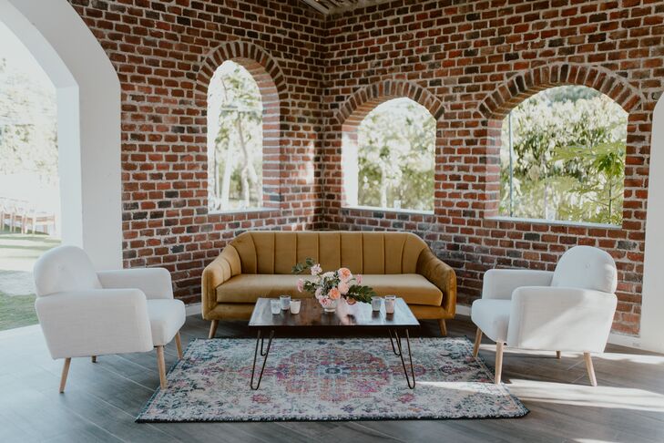 Modern Lounge Furniture with Brick Wall and Patterned Rug