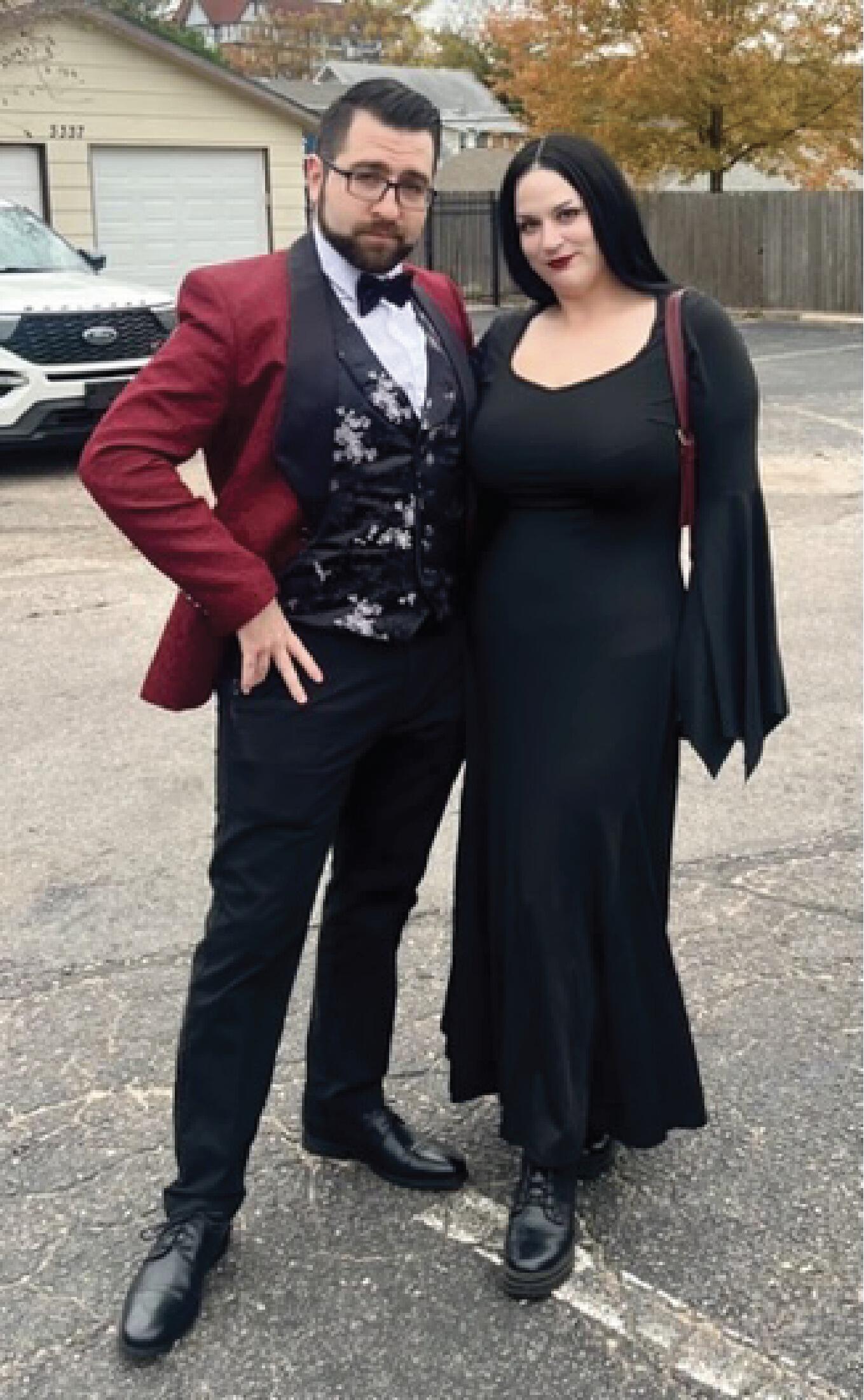 We got engaged on Halloween while dressed as Gomez and Morticia Adams