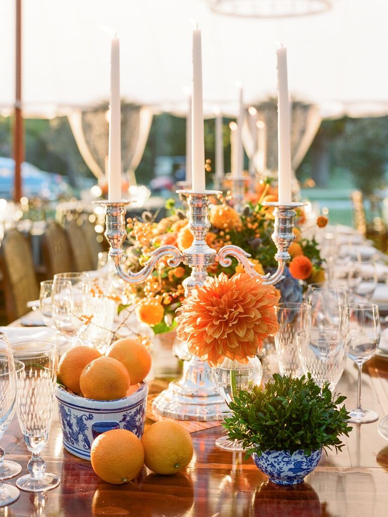 Oranges citrus herbs flower wedding table arrangements