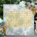 Retro, Grateful Dead-Inspired Escort Card Display With Tie-Dyed Flowers