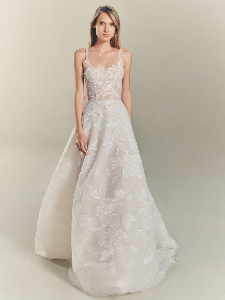 White embroidered wedding dress by Mira Zwillinger. 