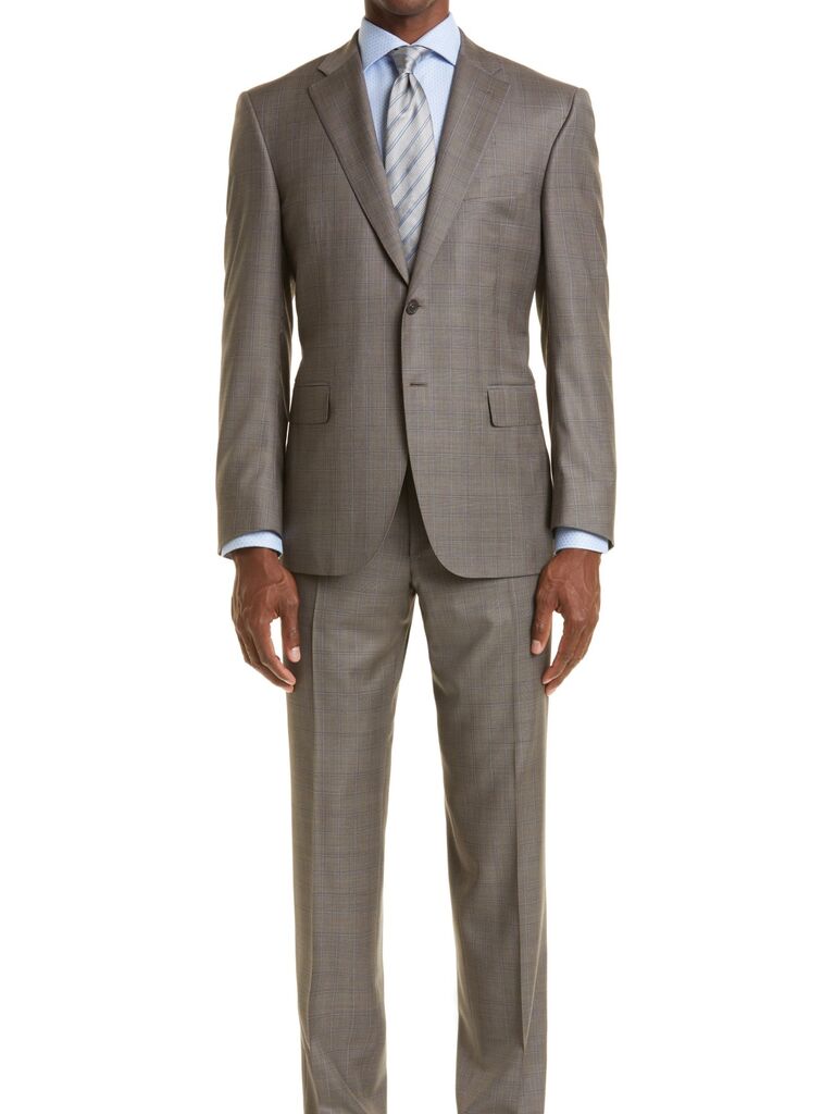 Neutral-colored suit, fashion trends 2023. 