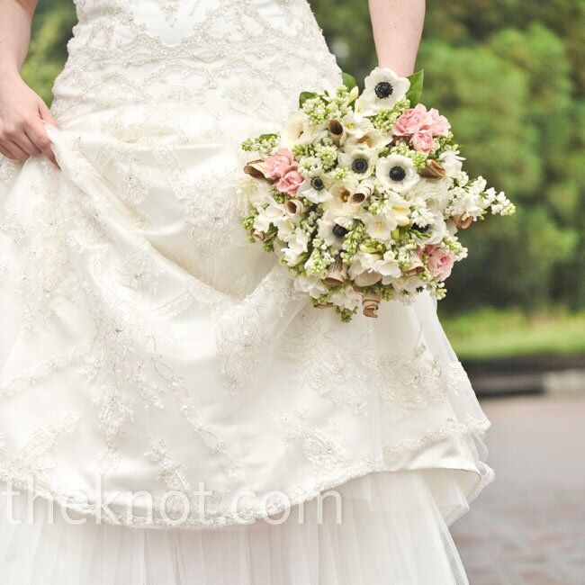 Danielle saw her gown in a shop window and knew right away it was her dream dress. She added fuchsia heels for a pop of color.