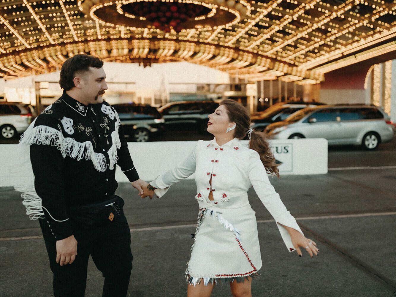 Couple holding hands in Las Vegas