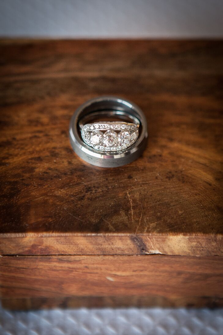 "The ring is a vintage piece from the estate area at Borsheim’s in Omaha, Nebraska," Laura says. "We had looked at a few together, but Scott knew the one as soon as he saw it. The center diamond is an old mine cut from the 1800s, and the ring itself is from the 1950s. It’s platinum and I have never seen anything like it."