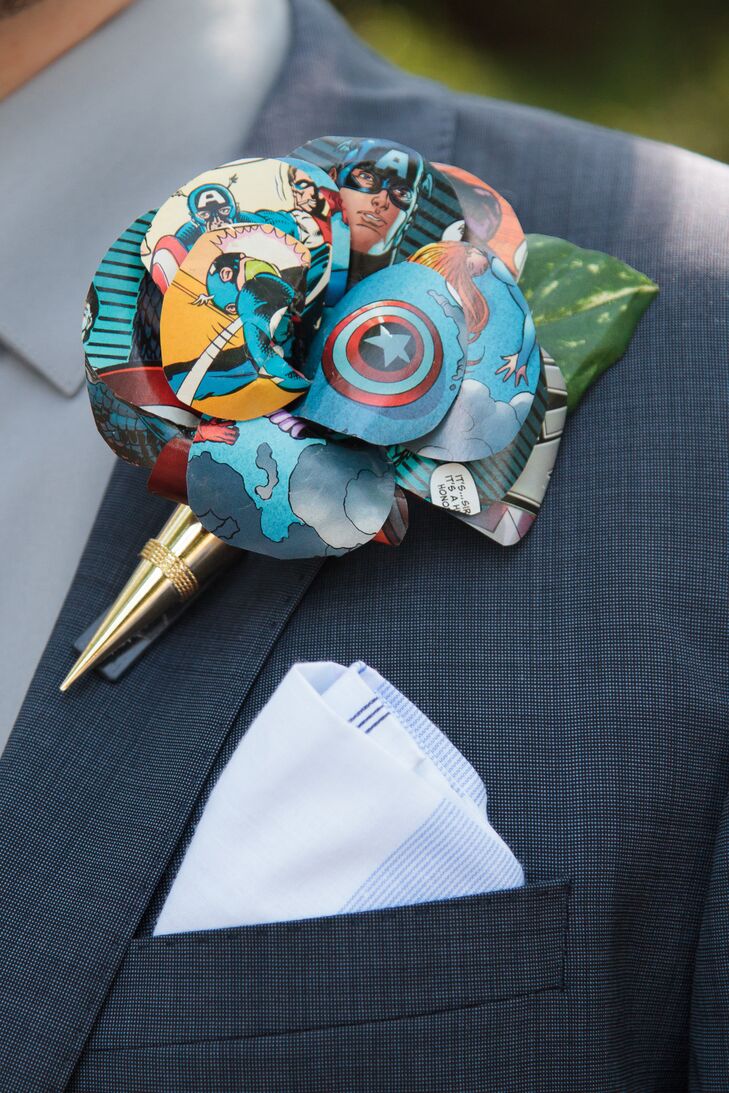 Justin's boutonniere matched Rebecca's bouquet and was made of paper flower depicting comic book images.