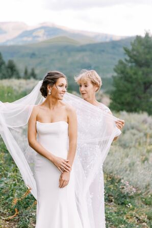 Mother-of-the-Bride Putting Veil on Bride at Wedding in Crested Butte, Colorado