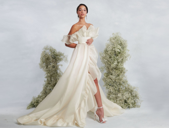Silk strapless gown with ruffles on neckline and train