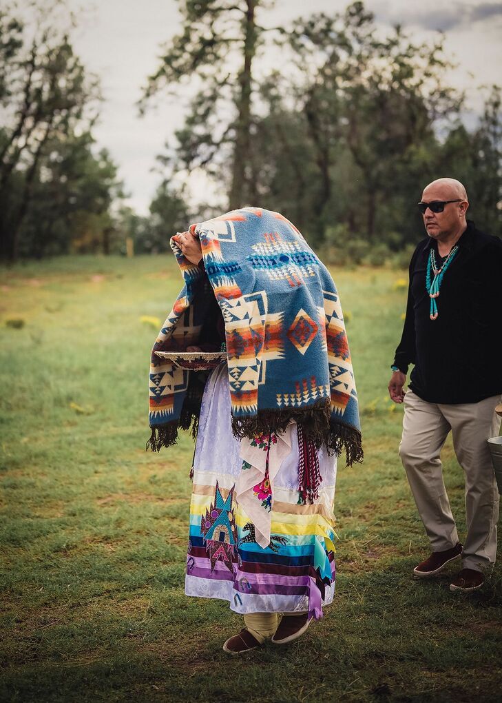 Bride Covers Her Head With Traditional Colorful Native American Navajo Blanket During Processional