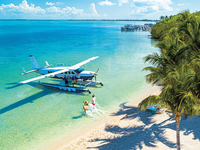 couple boarding seaplane in Key Largo, Florida