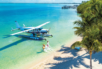 couple boarding seaplane in Key Largo, Florida