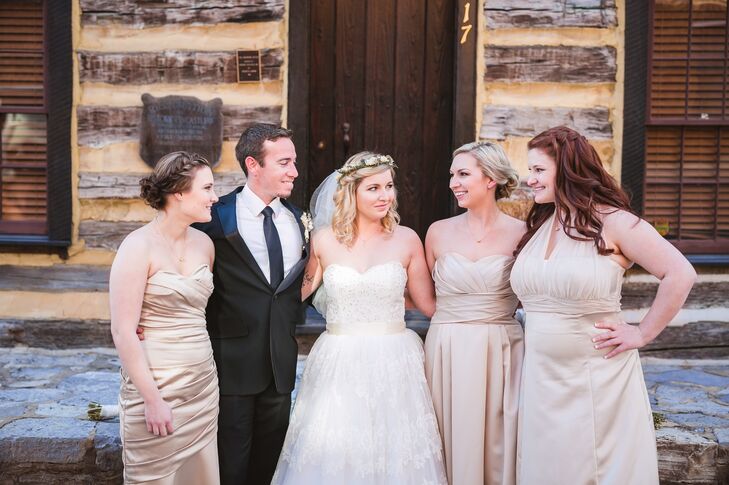 All of Marianne's bridesmaids wore champagne dresses in different styles. Her "brides-man" wore a classic black suit.