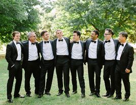 Groomsmen in tuxedos with bowtie