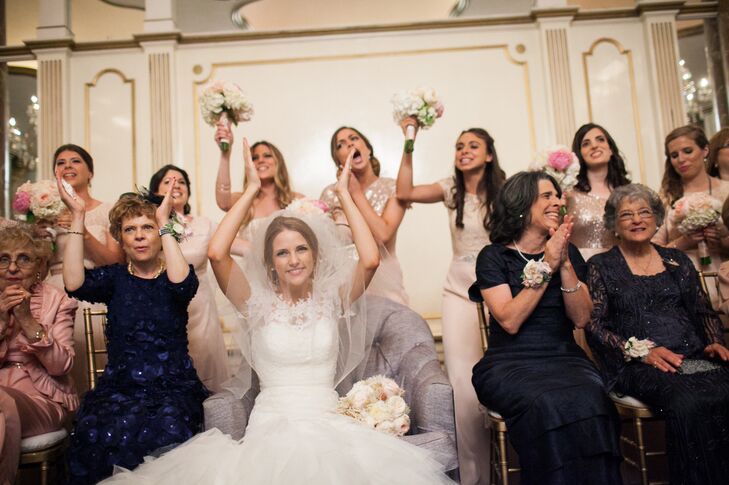 Ashira and Avi's traditional Jewish wedding ceremony at  began with a Tisch and Bedeken—a custom where men and women celebrate separately before the groom is marched in to see his bride amid a huge amount of excitement and fanfare.