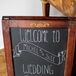 The couple said “I do” outside at the Trump Winery, and the reception was held under the vineyard’s beautiful pavilion. They welcomed guests with a rustic chalkboard sign directing guests where to go on the immense, vineyard property.