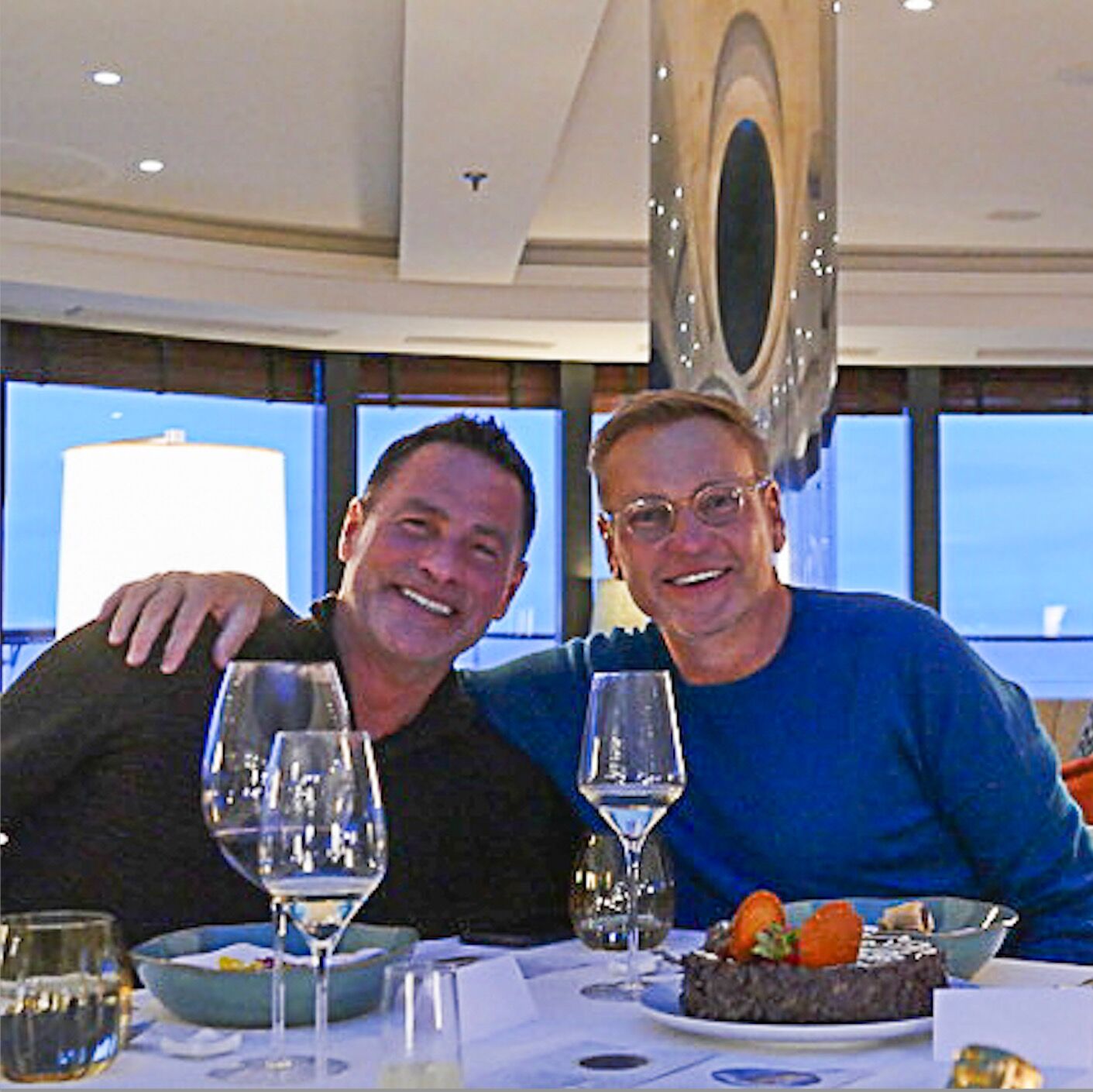 Picture of (Mr. & Mr.) Ted Chigaros and Todd Howell on Atlas' World Navigator to Antarctica for Todd's 60th in 2023.