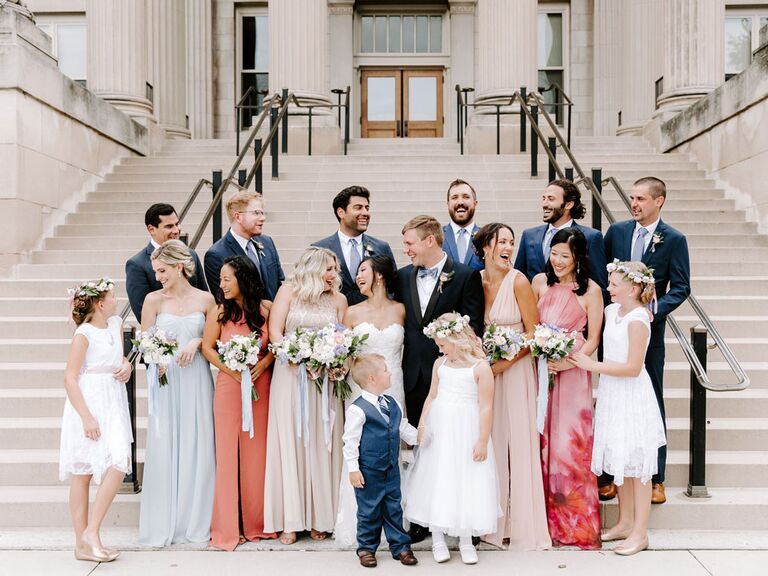 Bride and groom with wedding party and ring bearer and flower girl