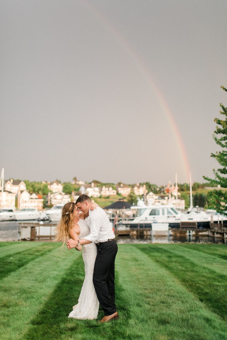 Bride and Groom With Rainbow During Wedding Reception
