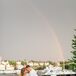 Bride and Groom With Rainbow During Wedding Reception