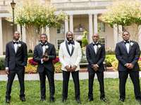 Groom with best man and groomsmen