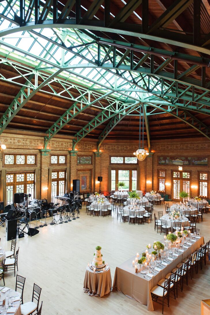 The newlyweds celebrated with 180 guests at the expansive Cafe Brauer in Lincoln Park. "We loved that it perfectly combined the elegance of the city with the surrounding nature," Christine says. "It was an incredible venue and truly breathtaking."