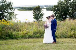 Brides in Midnight Blue Navy Suit and Ivory Gown