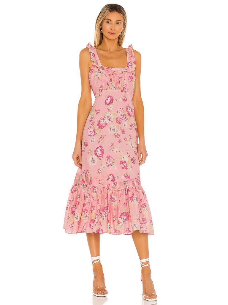 revolve pink pastel dress for wedding guests with floral print and ruffled straps and ruffle trimmed skirt
