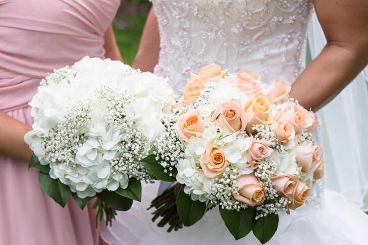 The wedding-day florist, Flowers, Petals and Gifts, created all the flower arrangements, using mostly white hydrangeas and some peach roses. Mandy carried a bouquet of peach roses, white hydrangeas and baby's breath while her maid of honor carried a bouquet of white hydrangeas and baby's breath.