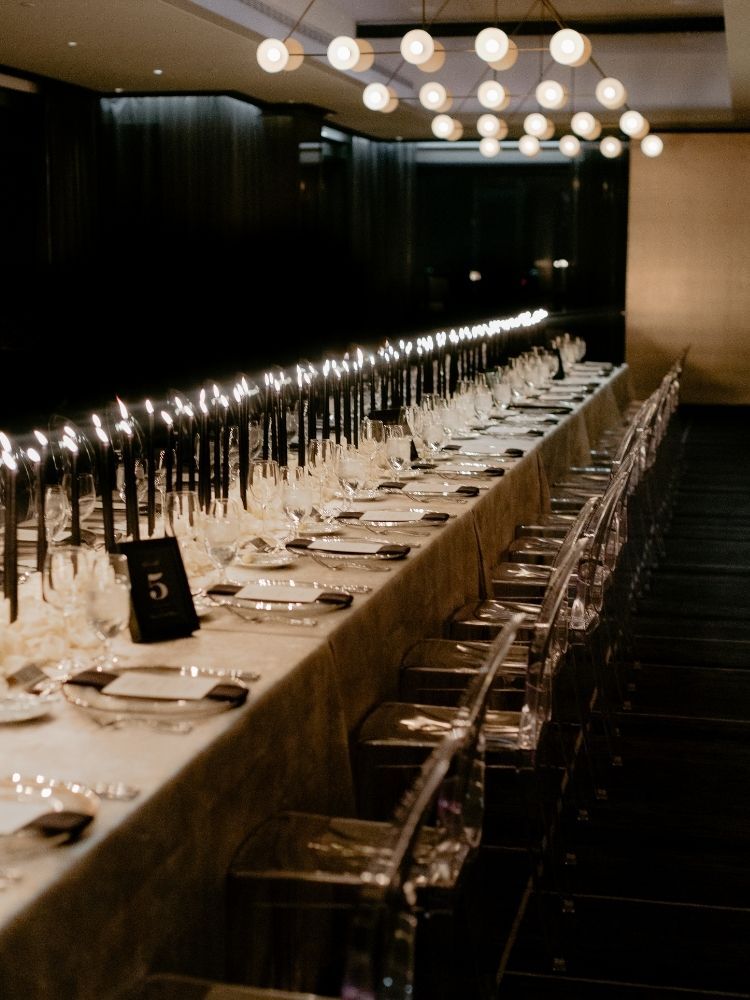 modern tablescape with black taper candles