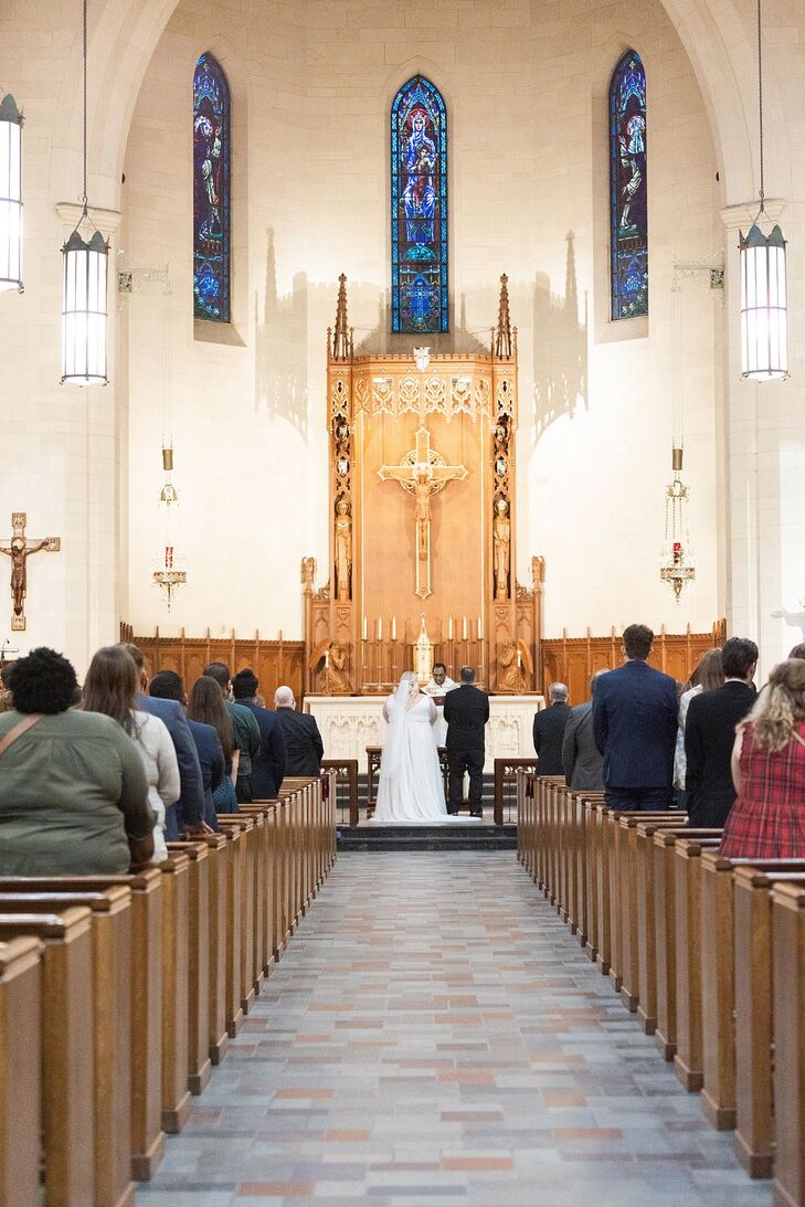 Bride and Groom at the Altar of a Catholic Church for Their Ceremony in Houston