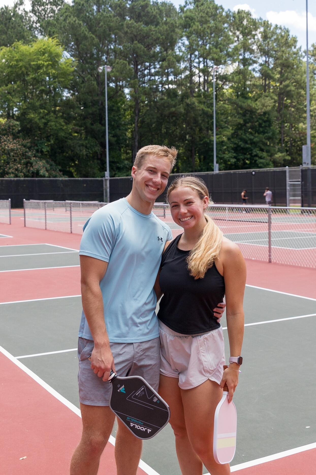 This photo commemorates hours and hours of absolute dominance on the pickleball courts together.