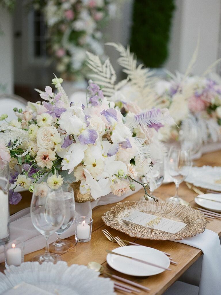 pastel wedding centerpiece with anemones, roses and sweet peas