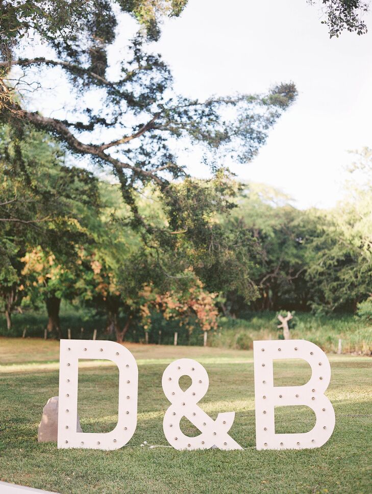 Three-foot-tall letters spelled out the newlywed's initials on the lawn of their reception venue.