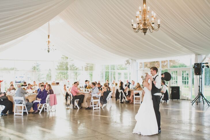Bride and Groom's First Dance Under Chandelier