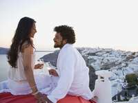 Couple toasting champagne on honeymoon