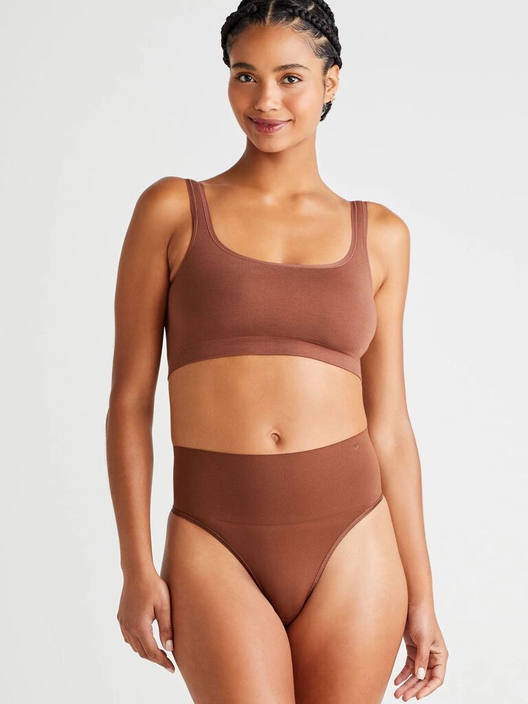 Model wearing skin-tone shaping thong and matching bra wedding undergarments