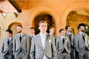 Groomsmen in Gray Tuxes with Purple Boutonnieres