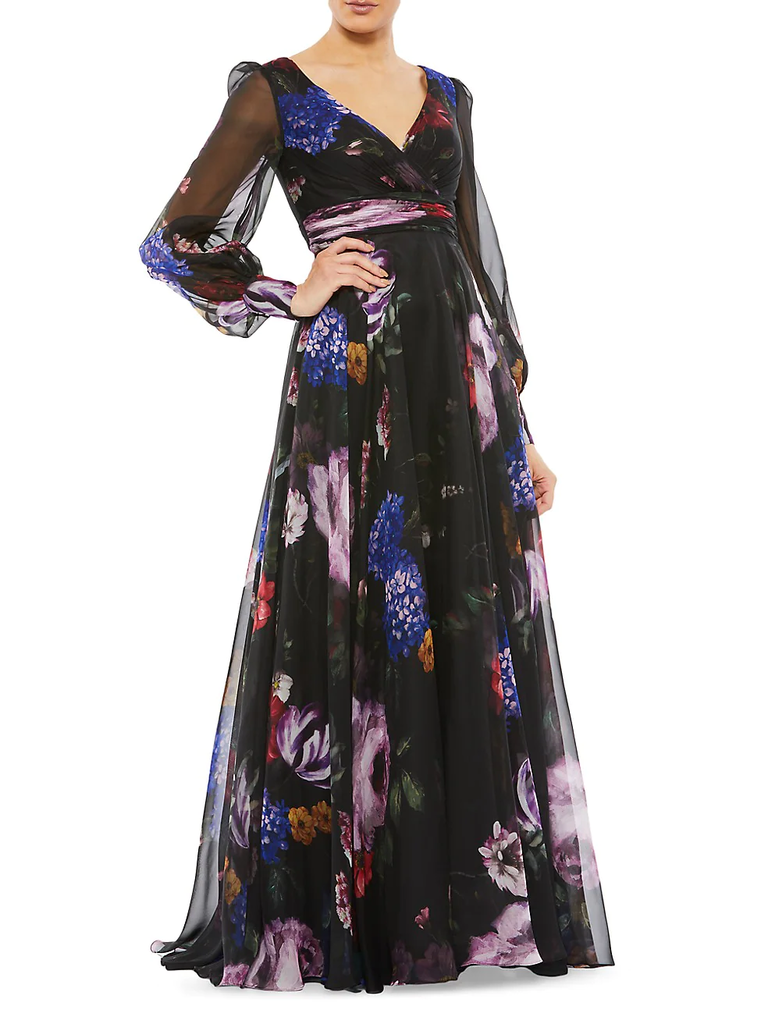 A model wears this floor-length black and floral gown.